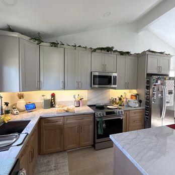 Hi Quality Construction - Open layout for the kitchen - we chose two tones for our cabinets and it came out great! - Painters Near Me