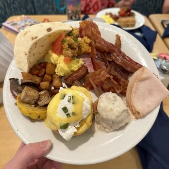 Cape May Cafe - Options from the Buffet: Build a Taco, Bacon, Deli Meat, Biscuit and Gravy, Eggs Benedict, Tofu and Vegetables, Sausage - Seafood Near Me - Lake Buena Vista, Florida Cape May Cafe - Options from the Buffet: Build a Taco, Bacon, Deli Meat, Biscuit and Gravy, Eggs Benedict, Tofu and Vegetables, Sausage - Seafood Near Me - Lake Buena Vista, Florida