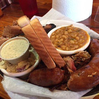 The Joint - The Joint: three meat plate (brisket, pulled pork, sausage) and two sides (potato salad, beans). - Barbeque Near Me - New Orleans, Louisiana The Joint - The Joint: three meat plate (brisket, pulled pork, sausage) and two sides (potato salad, beans). - Barbeque Near Me - New Orleans, Louisiana