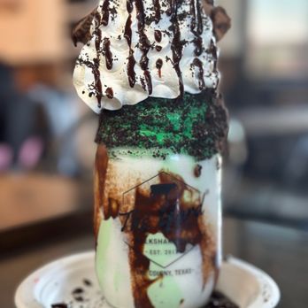 The Yard Milkshake Bar - Mint ice cream milkshake with whipped cream and a brownie - Desserts Near Me - The Colony, Texas The Yard Milkshake Bar - Mint ice cream milkshake with whipped cream and a brownie - Desserts Near Me - The Colony, Texas