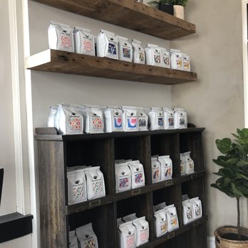 Conscious Cup Coffee Roasters - Freshly roasted coffee for sale at this location as well. Love the floating barnwood shelves. - Coffee Roasteries Near Me - Cary, Illinois