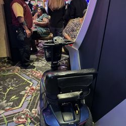 Treasure Chest Casino - Casino management and The unoccupied scooter that was sitting across the aisle from where my Sister that is a paraplegic.