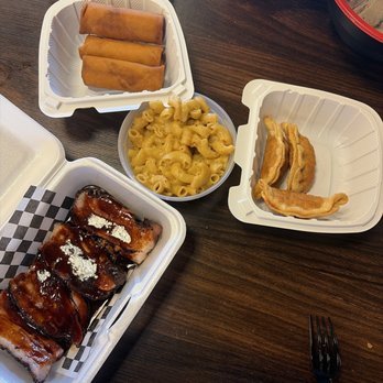 Kuma Ramen - Egg roll, gyoza, pork belly that I slathered with spicy bbq sauce. - Ramen Near Me - Hanford, California Kuma Ramen - Egg roll, gyoza, pork belly that I slathered with spicy bbq sauce. - Ramen Near Me - Hanford, California