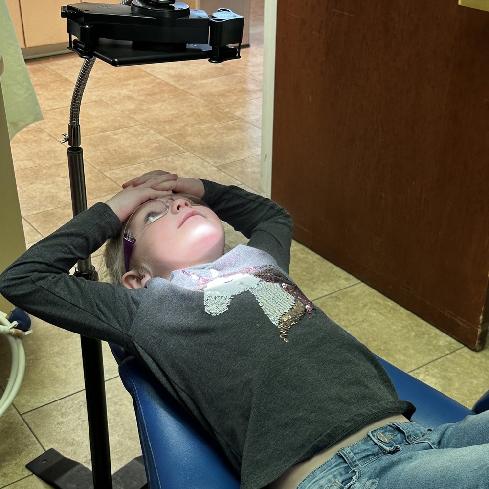 Dentists 4 Children - Watching a movie while waiting for her crown:) - Pediatric Dentists Near Me - Montgomery, Alabama Dentists 4 Children - Watching a movie while waiting for her crown:) - Pediatric Dentists Near Me - Montgomery, Alabama