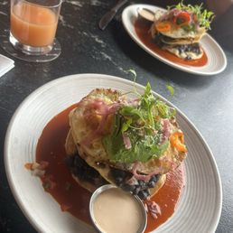 Huevos rancheros with shaved ribeye and fresh squeezed grapefruit juice. Yummy!