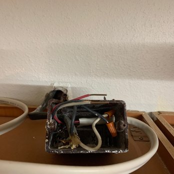L L Electric - Open and live junction box over another kitchen cabinet. - Electricians Near Me
