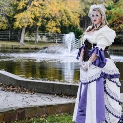Gray Acres Country Wedding & Events - Bride poses in front of the pond.