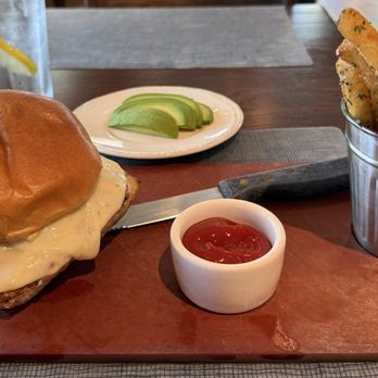 BRGR Kitchen & Bar - Mahi Mahi Burger and truffle fries - Burgers Near Me - Sanibel, Florida BRGR Kitchen & Bar - Mahi Mahi Burger and truffle fries - Burgers Near Me - Sanibel, Florida