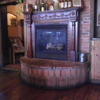 Jean-Pierre Bakery - Beautiful brick fireplace inside - Bakeries Near Me - Durango, Colorado Jean-Pierre Bakery - Beautiful brick fireplace inside - Bakeries Near Me - Durango, Colorado