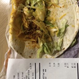 Receipt showing taco supreme and the taco we got