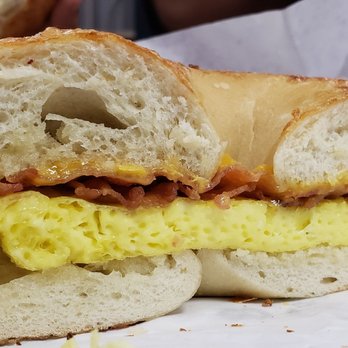 Bagel Nosh - Bacon, egg, and American cheese on a plain bagel - Bagels Near Me - Gilbert, Arizona Bagel Nosh - Bacon, egg, and American cheese on a plain bagel - Bagels Near Me - Gilbert, Arizona