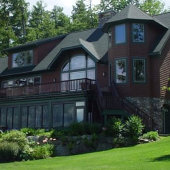 Landscapes by Tom - a large house with a large lawn - Landscaping Near Me - Meredith, New Hampshire