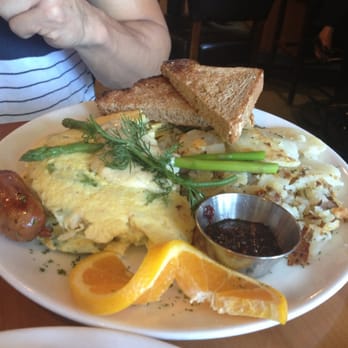 Plums Cafe - Crab and asparagus omelette. So much crab!! - Breakfast & Brunch Near Me - Costa Mesa, California