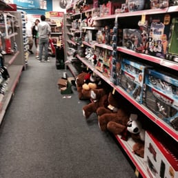 teddy bears in a store aisle