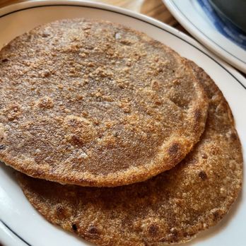 Woodberry Kitchen - Whole spelt rotis with the Chesapeake Curries dish - American Near Me - Baltimore, Maryland Woodberry Kitchen - Whole spelt rotis with the Chesapeake Curries dish - American Near Me - Baltimore, Maryland