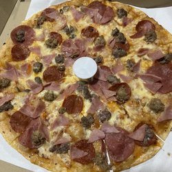 Shakey’s - thin crust it is! - not oily.