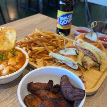 Cubanidad - The "305" Miami Cuban Sandwich, Fried Plantain tostones, Homemade Fries - Cuban Near Me - Henderson, Nevada Cubanidad - The "305" Miami Cuban Sandwich, Fried Plantain tostones, Homemade Fries - Cuban Near Me - Henderson, Nevada