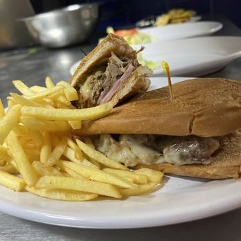 El Patio de Sam - Cuban Sandwich with fries and pickle wedge - Puerto Rican Near Me - San Juan, Puerto Rico El Patio de Sam - Cuban Sandwich with fries and pickle wedge - Puerto Rican Near Me - San Juan, Puerto Rico