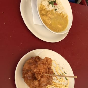 Catalina - Chicken curry with rice and curried shrimp and squash puff - Tapas Bars Near Me - Seville, SE Catalina - Chicken curry with rice and curried shrimp and squash puff - Tapas Bars Near Me - Seville, SE