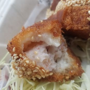 Local Tide - Bite out of the shrimp (and pork) toast - Seafood Near Me - Seattle, Washington