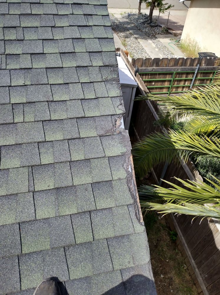 Slide of Hamilton Roofing