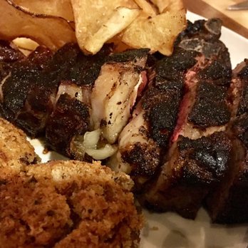 Echo & Rig - Tamahawk steak with stuffed mushrooms and housemade chips - Steakhouses Near Me - Las Vegas, Nevada Echo & Rig - Tamahawk steak with stuffed mushrooms and housemade chips - Steakhouses Near Me - Las Vegas, Nevada