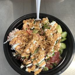 Hawaiian tuna/spiced Tuna. White rice Crab Avocado/cucumber/green onions. Aioli and garlic aioli