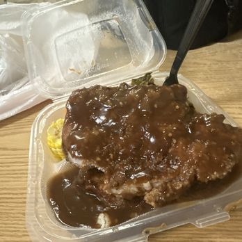 Frickin Fried - Smothered pork chops with gravy and rice along with corn . - Southern Near Me - Concord, California Frickin Fried - Smothered pork chops with gravy and rice along with corn . - Southern Near Me - Concord, California