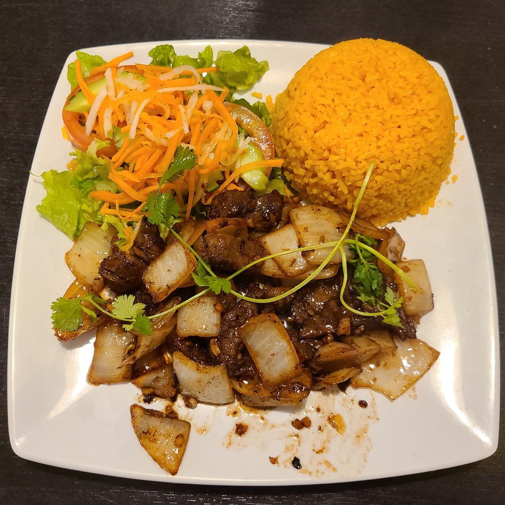 Simply Pho - #15 tenderized beef and tomato rice - Noodles Near Me - Orange, California Simply Pho - #15 tenderized beef and tomato rice - Noodles Near Me - Orange, California