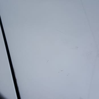 Messenger Motorworks - Blatant disregard for care of your vehicle.  Scratches on the trunk from when they were adding tint with no intention to fix it. - Car Window Tinting Near Me - Davenport, Iowa