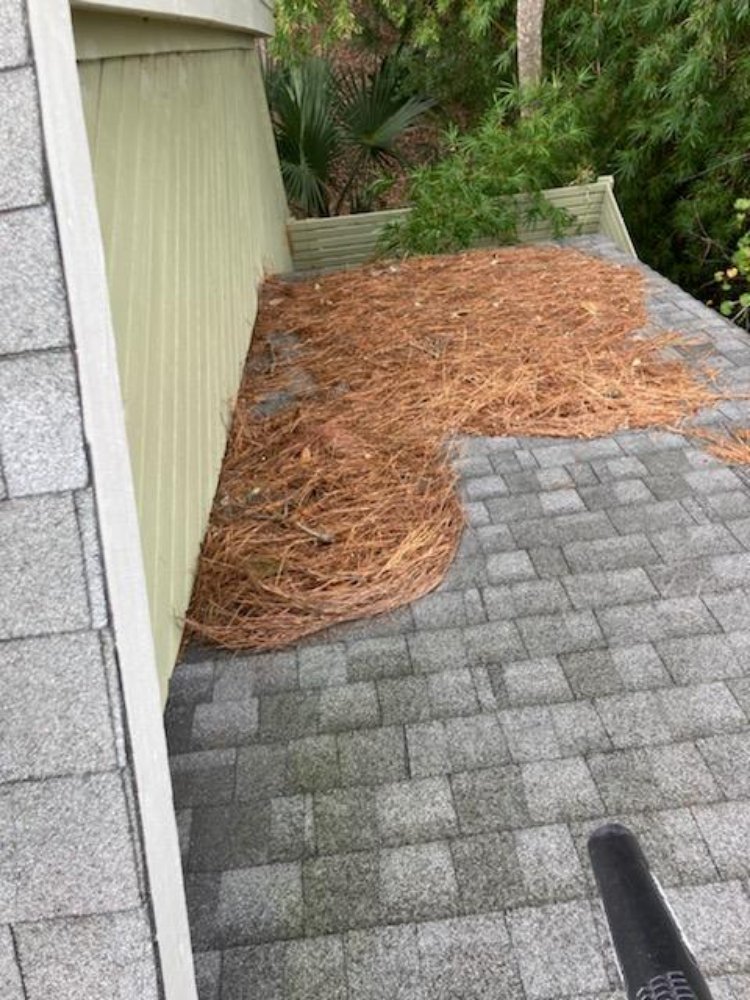 Slide of Roof and Gutter Cleaning