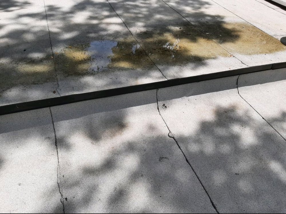 Slide of Champion Roofing Services