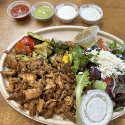 Carved Rotisserie Chicken Plate with Greek Salad and Veggies Carved Rotisserie Chicken Plate with Greek Salad and Veggies