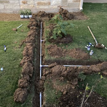 KenTexan Outdoor Services - Example of attaching lines to an already existing line to add bubblers - Irrigation Near Me KenTexan Outdoor Services - Example of attaching lines to an already existing line to add bubblers - Irrigation Near Me