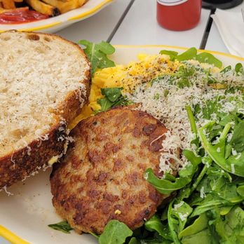 Cardinal Provisions - Cacio pepe eggs with sausage, sourdough, arugula, and fries - Breakfast & Brunch Near Me - Asbury Park, New Jersey Cardinal Provisions - Cacio pepe eggs with sausage, sourdough, arugula, and fries - Breakfast & Brunch Near Me - Asbury Park, New Jersey