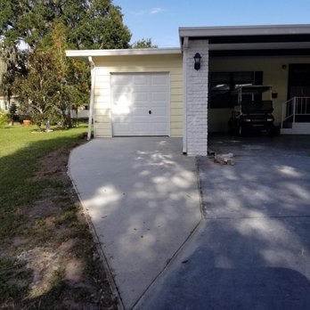Aggressive Cement Solutions - Driveway was supposed to go straight and meet neighbor's drive to be wide enough to park a car. Steve curved it... now only golf cart wide. - Masonry/Concrete Near Me Aggressive Cement Solutions - Driveway was supposed to go straight and meet neighbor's drive to be wide enough to park a car. Steve curved it... now only golf cart wide. - Masonry/Concrete Near Me