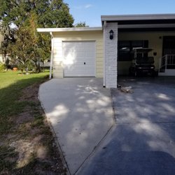 Aggressive Cement Solutions - Driveway was supposed to go straight and meet neighbor's drive to be wide enough to park a car. Steve curved it... now only golf cart wide.