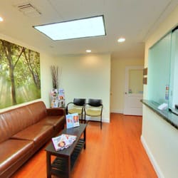 Smile Design Dental of Hallandale Beach - waiting area and front desk at our general dentistry office located opposite Hallandale Beach Bd@Layne Bd bus stop