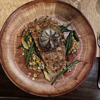 The Aerie - Almond crusted trout with corn succotash and beluga lentil cake. - New American Near Me - Snowbird, Utah The Aerie - Almond crusted trout with corn succotash and beluga lentil cake. - New American Near Me - Snowbird, Utah