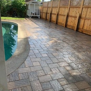 Block by Nick - This is a beautiful after photo of a paver pool deck we did & a hot tub area - Landscaping Near Me Block by Nick - This is a beautiful after photo of a paver pool deck we did & a hot tub area - Landscaping Near Me