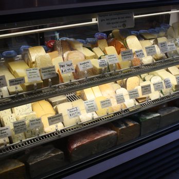 Lake Chelan Cheese - a display of cheeses - Cheese Shops Near Me - Chelan, Washington Lake Chelan Cheese - a display of cheeses - Cheese Shops Near Me - Chelan, Washington