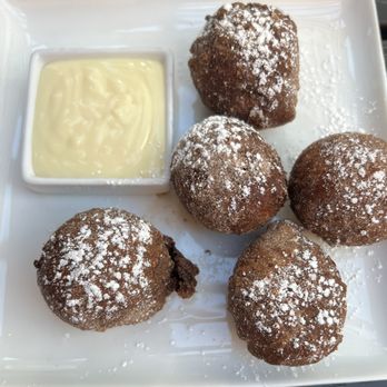 The Kitchen Table - beingets / cinnamon cayenne sugar, white chocolate sauce - Italian Near Me - Reno, Nevada The Kitchen Table - beingets / cinnamon cayenne sugar, white chocolate sauce - Italian Near Me - Reno, Nevada