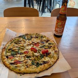 Blaze Pizza - My personal pizza with chicken, spinach, jalapeno, and tomatoes. Pesto sauce with olive and balsamic drizzle. It was very good!