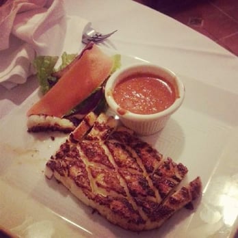 Lola's - A must try, grilled squid with a spicy sauce on the side. - Spanish Near Me - New Orleans, Louisiana Lola's - A must try, grilled squid with a spicy sauce on the side. - Spanish Near Me - New Orleans, Louisiana