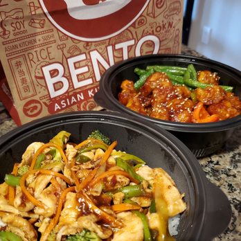 Bento Asian Kitchen + Sushi - Sriracha Garlic Rice Bowl in the back General Tso Rice Bowl in the foreground - Asian Fusion Near Me - Orlando, Florida