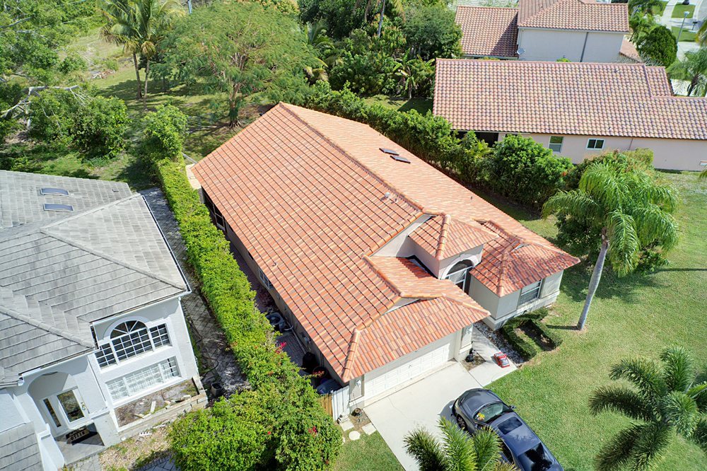 Slide of Louis Roofing