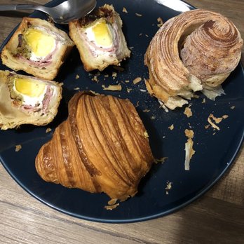 Fournée Bakery - cross section of the ham and egg croissant, morning bun, and plain croissant - Bakeries Near Me - Berkeley, California Fournée Bakery - cross section of the ham and egg croissant, morning bun, and plain croissant - Bakeries Near Me - Berkeley, California