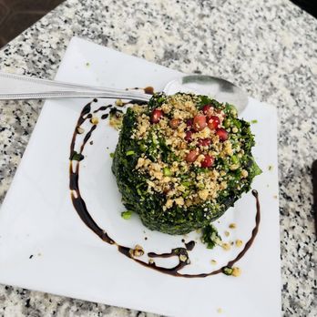 Suliko Restaurant - a plate of broccoli with sauce and a spoon - Russian Near Me - Concord, Ontario Suliko Restaurant - a plate of broccoli with sauce and a spoon - Russian Near Me - Concord, Ontario