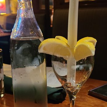 Old Ebbitt Grill - Water, lemon and straws for the table. - Bars Near Me - Washington, DC, District of Columbia