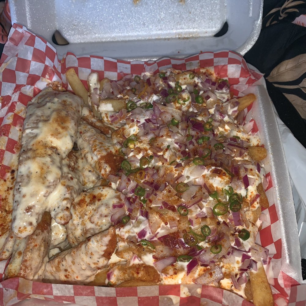 Wow! Wing House - Chicken fingers sauced in spicy garlic parmesan with chilli onion fries - Chicken Wings Near Me - Toronto, Ontario Wow! Wing House - Chicken fingers sauced in spicy garlic parmesan with chilli onion fries - Chicken Wings Near Me - Toronto, Ontario